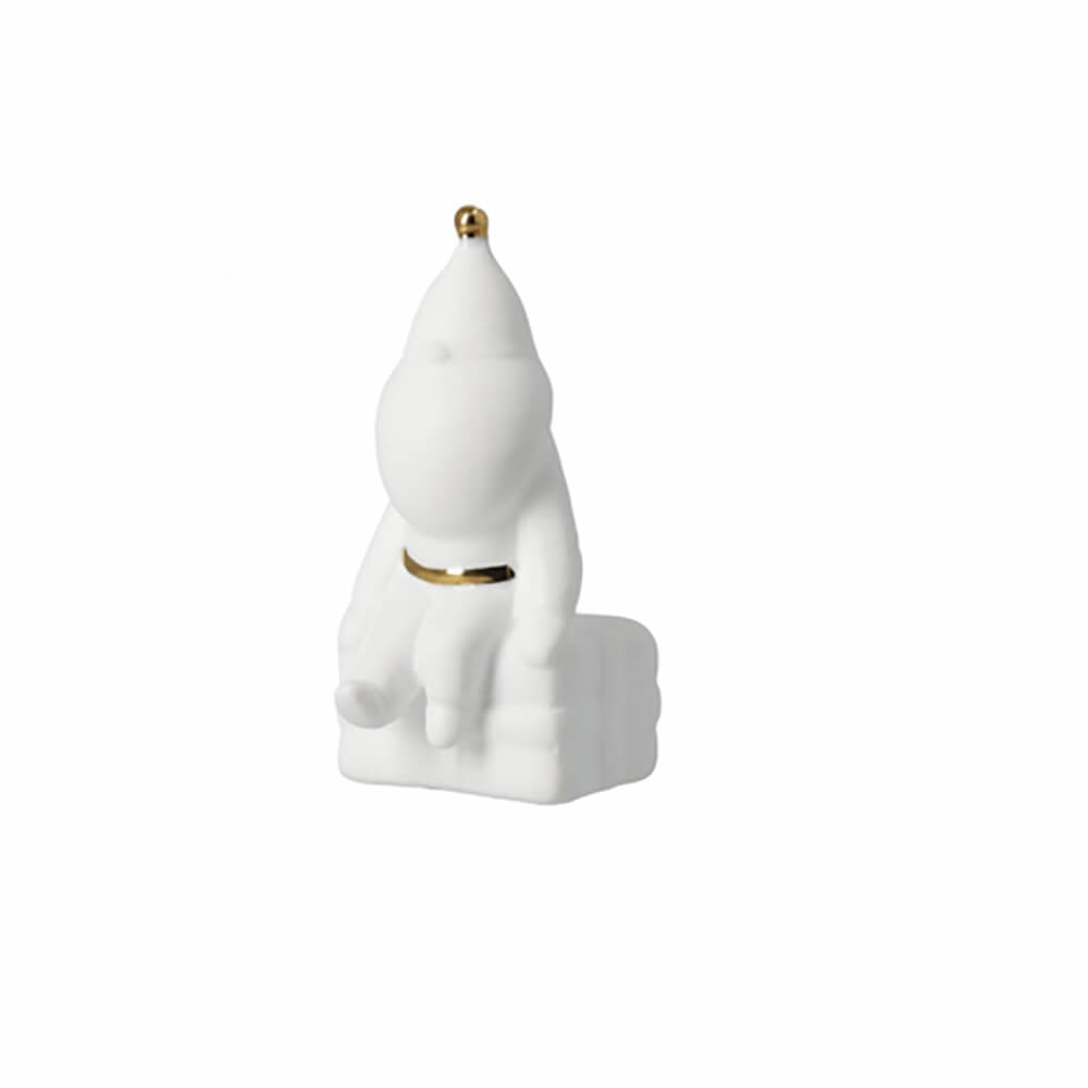 Figurine PERE NOEL assis sur un cadeau en porcelaine - Rader
